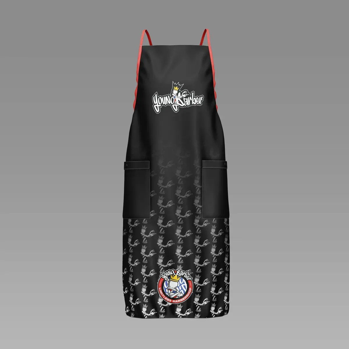 Black barber apron with the wordmark and a fading monogram pattern