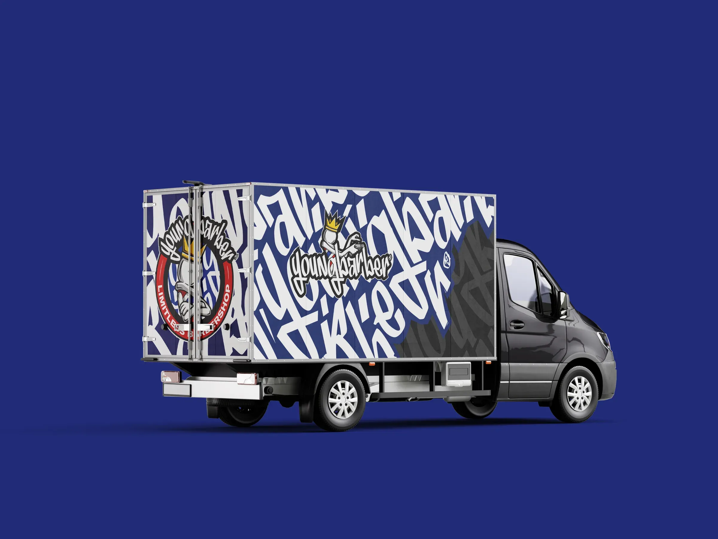 Delivery truck wrapped in blue, white and black graffiti lettering