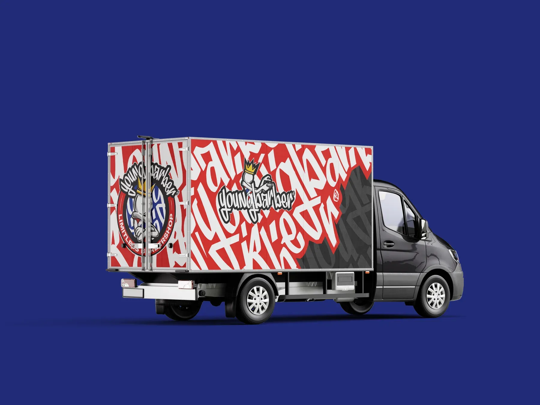 Delivery truck wrapped in red, white and black graffiti lettering